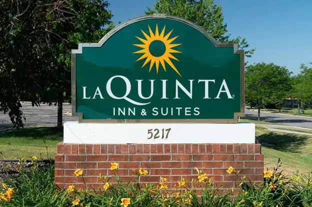 Modern business monument sign at a corporate entrance, boosting brand visibility and on-site wayfinding.