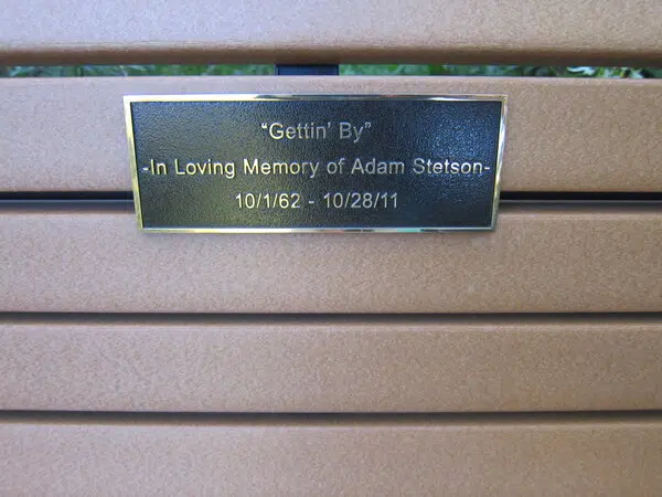 Custom metal plaque with engraved branding and premium finish, designed to elevate business visibility