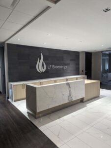 Professional custom interior business signage, with lobby logos, wall graphics, directional wayfinding, and door signs