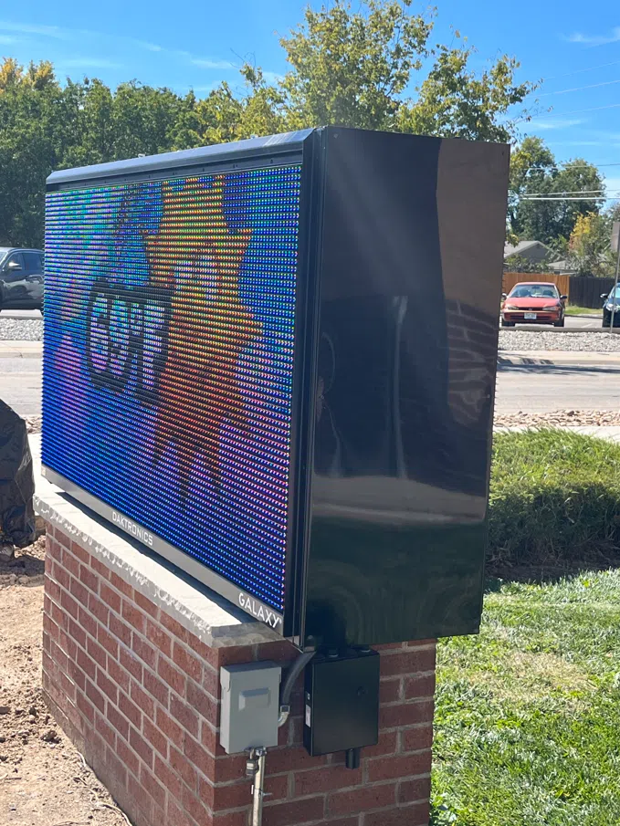 LED interactive sign demonstrating custom signage capabilities with bright, dynamic digital visuals