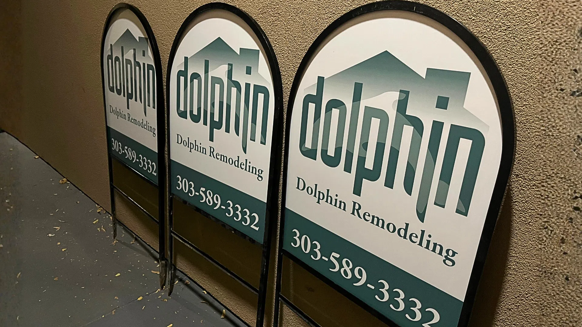 Custom A-frame sidewalk signs displayed outside a Denver business, designed to attract pedestrian traffic and increase local visibility.