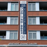 Custom apartment complex leasing sign mounted on a multifamily building serving the Littleton and Denver, Colorado market.